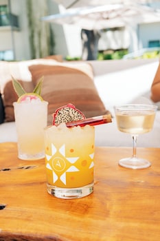 Outdoor pool, open 9:00 AM to 10:00 PM, pool cabanas (surcharge)