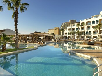 On the beach, beach cabanas, sun loungers, beach umbrellas
