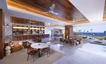 On the beach, beach cabanas, sun loungers, beach umbrellas