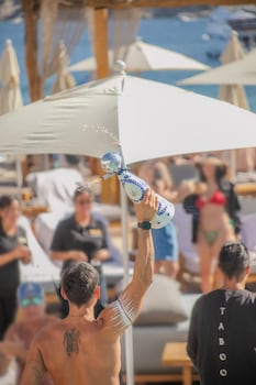 On the beach, beach cabanas, sun loungers, beach umbrellas