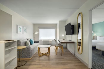 40-inch flat-screen TV with cable channels, streaming services