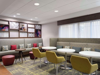 Desk, blackout drapes, iron/ironing board, free cribs/infant beds