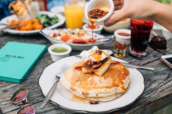 Hypo-allergenic bedding, down comforters, pillowtop beds, in-room safe