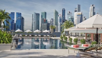 Outdoor pool, pool umbrellas, pool loungers