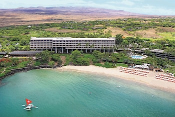 On the beach, sun-loungers, beach umbrellas, beach towels