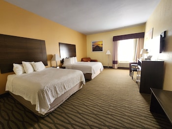 Suite, 1 King Bed, Non Smoking, Hot Tub (Refrigerator & Microwave) | Pillowtop beds, blackout drapes, iron/ironing board, free WiFi