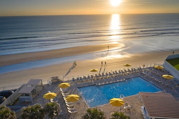 Outdoor pool, open 7:00 AM to 10:00 PM, cabanas (surcharge)