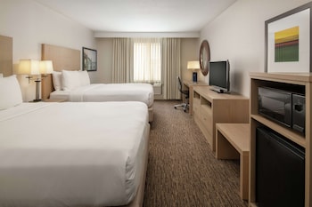 Premium bedding, down comforters, desk, laptop workspace