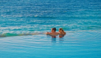Outdoor pool, pool umbrellas, sun loungers