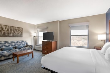 Suite, Non Smoking (2 Queen Beds with Sofabed) | Desk, laptop workspace, blackout drapes, soundproofing