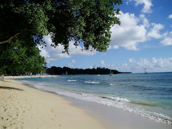 Beach nearby, white sand, sun loungers, beach umbrellas