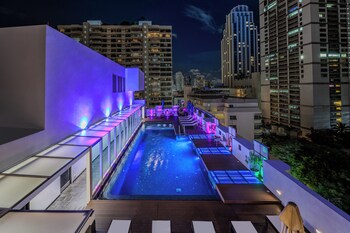 Outdoor pool, open 6:00 AM to 10:00 PM, pool umbrellas, sun loungers