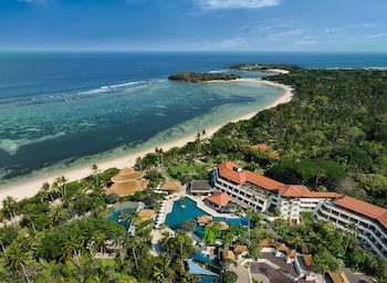 3 bars/lounges, swim-up bar, poolside bar. Nusa Dua Beach Hotel and Spa - Handwritten Collection