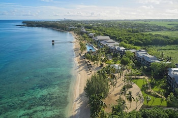 2 outdoor pools, an infinity pool, pool umbrellas