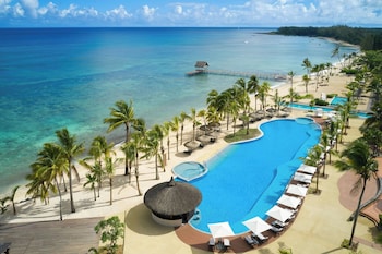 2 outdoor pools, an infinity pool, pool umbrellas