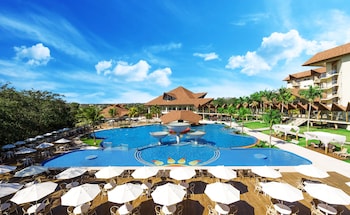 Indoor pool, outdoor pool, pool umbrellas, sun loungers