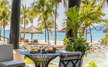 On the beach, sun loungers, beach towels
