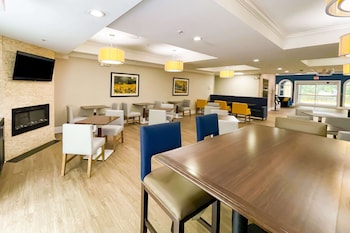 Premium bedding, pillow-top beds, desk, laptop workspace