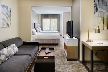 Studio Suite, 2 Double Beds | Living area | 37-inch LED TV with digital channels, TV