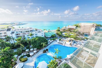 On the beach, sun loungers, beach umbrellas, beach towels
