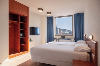 Estudio Confort | 1 habitación, caja de seguridad en la habitación y cunas gratuitas