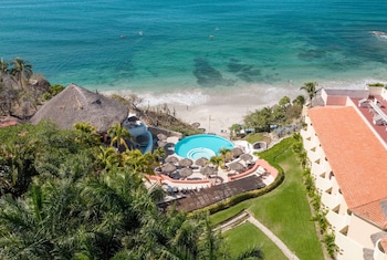 On the beach, sun loungers, beach umbrellas, beach towels