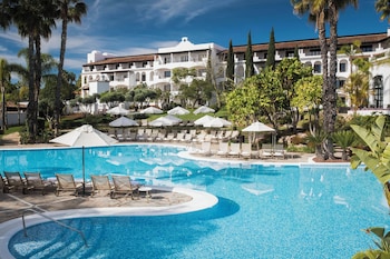 2 outdoor pools, pool umbrellas, pool loungers