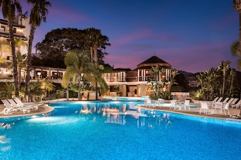 2 outdoor pools, pool umbrellas, pool loungers