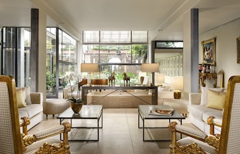 Seasonal outdoor pool, open 9:00 AM to 7:00 PM, pool umbrellas