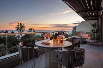 Lunch, dinner served; Mediterranean cuisine, beach views 