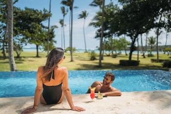 On the beach, sun loungers, beach towels