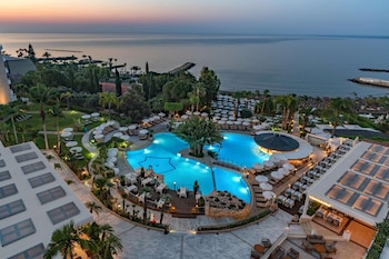 Indoor pool, outdoor pool, pool umbrellas, sun loungers