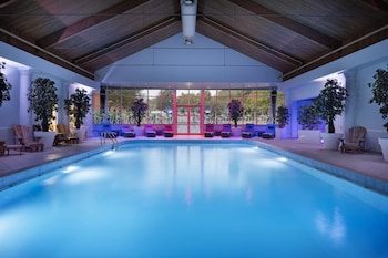 Indoor pool, open 7:00 AM to 9:00 PM, sun loungers