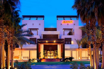 Indoor pool, 3 outdoor pools, open 8:00 AM to 8:00 PM, pool umbrellas