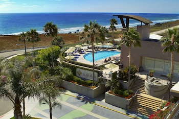 2 outdoor pools, pool umbrellas, pool loungers