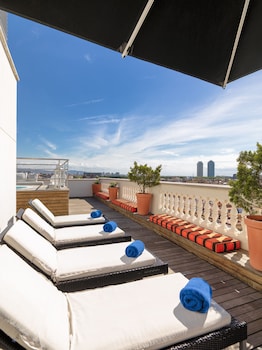 Enjoy panoramic views of the historic city from our rooftop terrace, where you can dine on-site amidst the urban landscape.