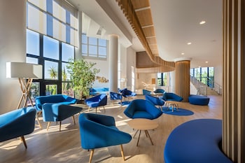 Seasonal outdoor pool, open noon to 8:00 PM, pool umbrellas