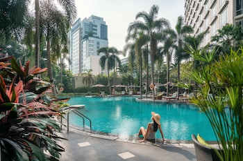 Outdoor pool, open 6:00 AM to 9:00 PM, pool umbrellas, pool loungers