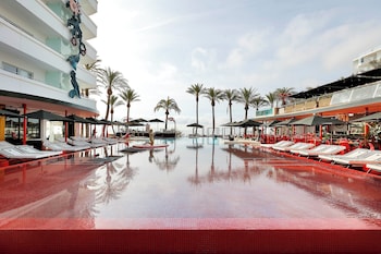 On the beach, sun-loungers, beach umbrellas, beach towels