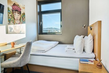 26-inch flat-screen TV with cable channels, TV