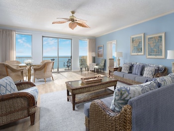 Suite, 4 Bedrooms, Oceanfront (Margate) | Living area | 50-inch flat-screen TV with cable channels, TV