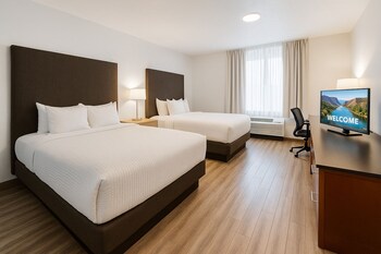 Suite, Plusieurs lits, non-fumeur (Upgrade) | Lit avec matelas à plateau-coussin, coffre-fort, ameublement unique