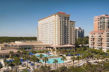 Indoor pool, outdoor pool, open 7:00 AM to 11:00 PM, pool umbrellas