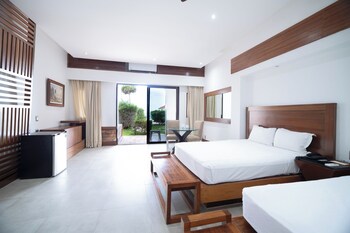 On the beach, white sand, beach umbrellas, beach towels