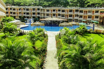 Outdoor pool, open 8:00 AM to 8:00 PM, pool umbrellas, pool loungers