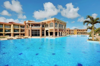 Indoor pool, outdoor pool, open 7:00 AM to 6:00 PM, pool umbrellas