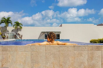 Outdoor pool, open 8 AM to 8 PM, free cabanas, pool umbrellas