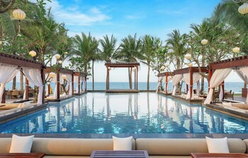 2 bars/lounges, poolside bar, beach bar