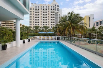 Outdoor pool, free cabanas, pool umbrellas