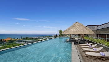 Outdoor pool, open 7:00 AM to 7:00 PM, pool umbrellas, sun loungers